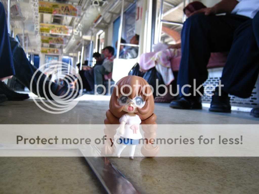 Mimi is strolling inside the train Mimi is strolling inside the train