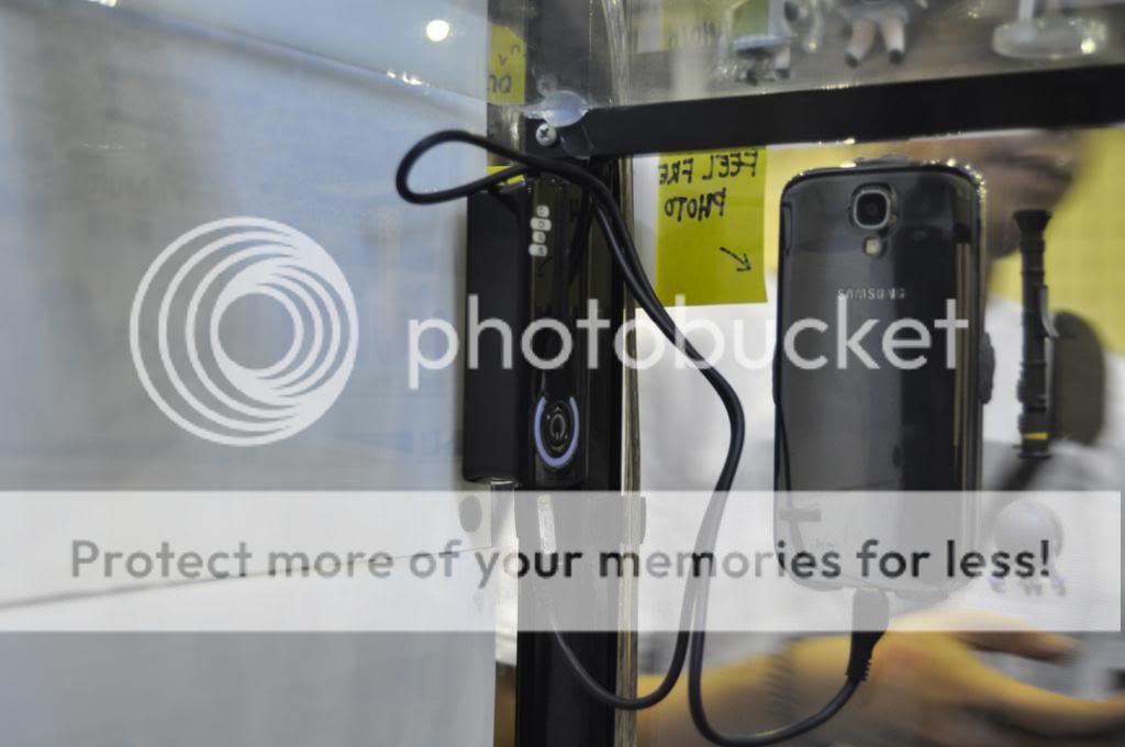 Smartphone on glass wall Smartphone on glass wall